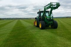 Natural turf sports field construction maintenance